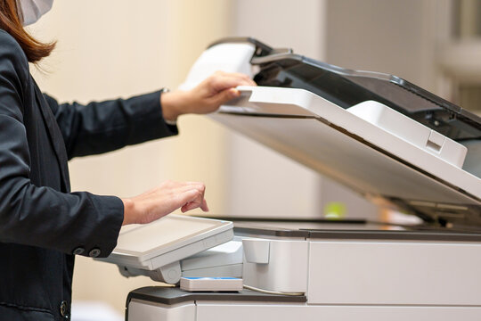 businesswoman using photocopier printer scanner laser office copy machine supplies start concept