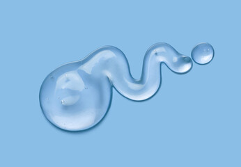 Cosmetic serum gel beauty on blue color background. Skincare beauty product with bubbles texture.