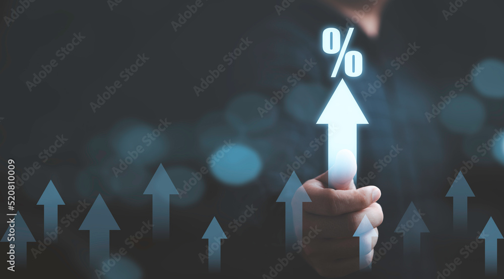 Wall mural Red percentage print screen on wooden block stacking for interest financial rating and financial ranking concept.