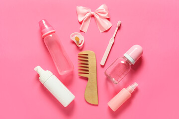 Bath accessories for baby girl on pink background