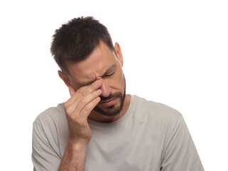 Man suffering from eyestrain on white background