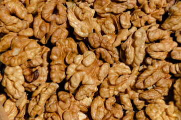 Background of many nuts from crushed walnut kernels, Sofia, Bulgaria 