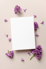 Invitation card template with flowers composition, blank card mockup