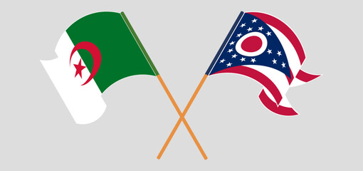 Crossed and waving flags of Algeria and the State of Ohio