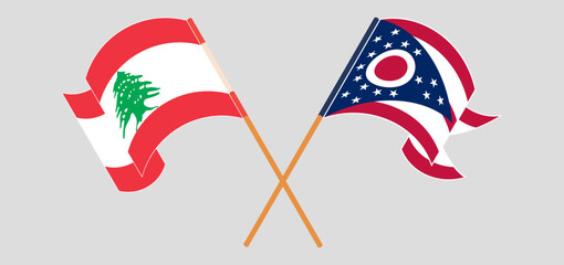 Crossed and waving flags of the Lebanon and the State of Ohio