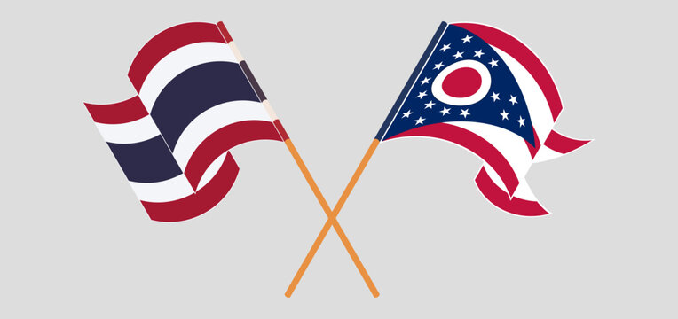 Crossed and waving flags of Thailand and the State of Ohio