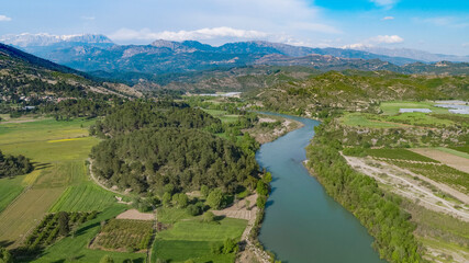 A river flowing among the agricultural fields in Antalya city, Turkey.