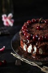 chocolate cake with cherries and cream 