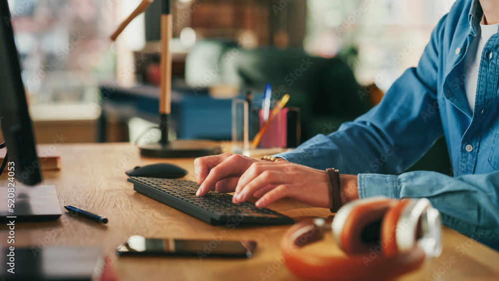 Poster Close Up on Hands of a Man Working from Loft Apartment on Desktop Computer. Creative Male Typing on Keyboard, Checking Social Media, Browsing Internet from Home.