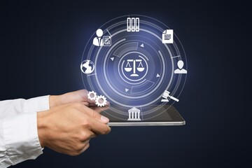 Justice and law concept. Lawyer business hands using  innovation network icons on blue blurred background.