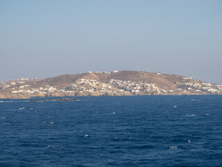 Fototapeta premium Panoramic views of the Greek islands. Vacation. Mediterranean. Cruise ship. Windmills. Nature