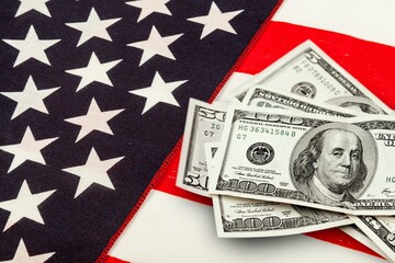 dollar money and American flag. counting money cash. business crisis finance dollar concept.