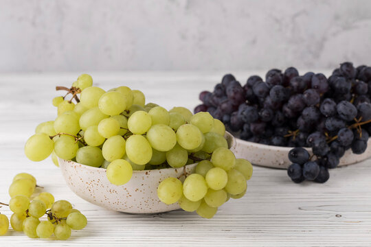 fresh juicy red and white grape on plate