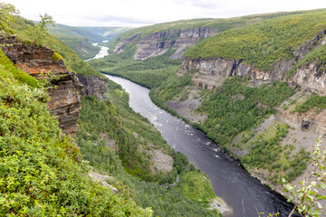 Fototapeta na wymiar The Sautso Alta canyon: view of River Alta and gorge. Alta, Finnmark, Norway.