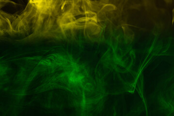 Yellow steam on a black background.