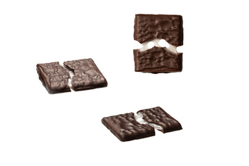 Dark chocolate candies isolated on white background.