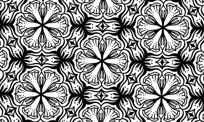 Black and white circle flower pattern in vintage mandala style for tattoos, fabrics or decorations and more	