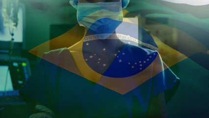 Animation of brazilian flag waving over caucasian female doctor wearing surgery mask and cap - Powered by Adobe