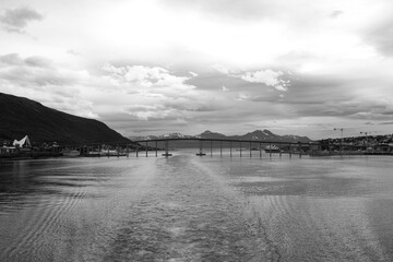 black and white view of Bruvegen Bridge.Tromsøbrua from coastal express Hurtigruten.  Old postal...