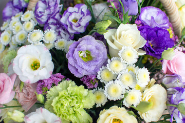 a bouquet of various flowers of different colors close-up