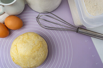 Ingredients for baking on the kitchen table. The process of making tarte.