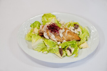 View on white background of salad with meat. Healthy food, diet lunch concept.