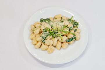 View on white background of dumplings. Healthy food, diet lunch concept.