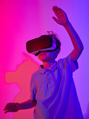 Child in glasses of virtual reality