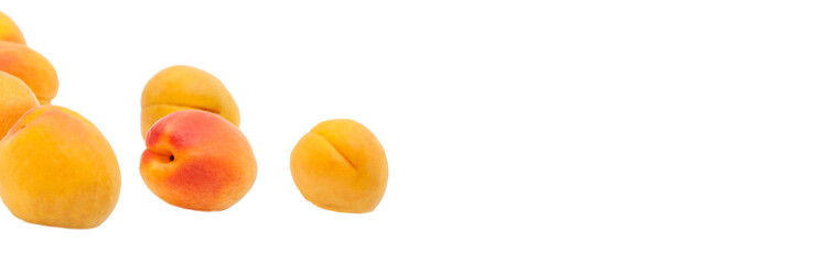 Naklejka na ściany i meble Beautiful apricots on a white texture. Isolated ripe peaches. Juicy white plums on a light background. Fruit growing concept.