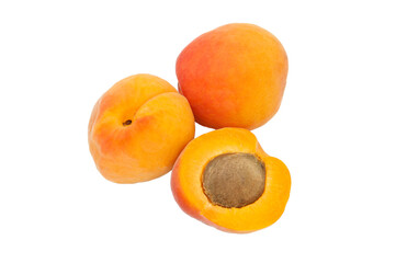 Beautiful apricots on a white texture. Isolated ripe peaches. Juicy white plums on a light background. Fruit growing concept.
