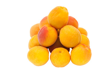 Beautiful apricots on a white texture. Isolated ripe peaches. Juicy white plums on a light background. Fruit growing concept.