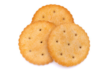 Healthy whole wheat cracker on white background. Stack of Saltine crackers isolated on white background. Round crackers.