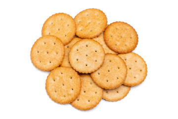 Healthy whole wheat cracker on white background. Stack of Saltine crackers isolated on white background. Round crackers.