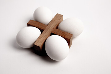 Chicken egg on metal forks, spoons isolated on white background close-up.
An egg that is set on top of two forks, spoons. Eggs have so many uses from diet to baking recipes.