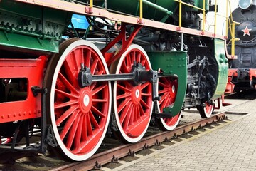 photo on the big wheels of an old train