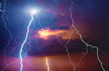 Fork lightning striking down during summer storm