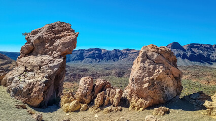 Panoramic view on mount Guajara, Roque de la Grieta in volcano Mount Teide National Park, Tenerife, Canary Islands, Spain, Europe. Volcanic barren desert landscape canyon. View from Minas de San Jose