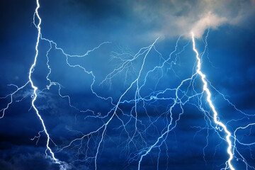 Fork lightning striking down during summer storm