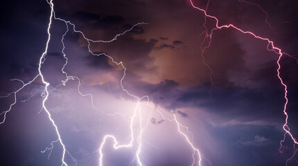 Fork lightning striking down during summer storm