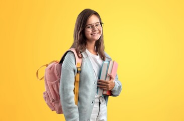 cheerful teen girl carry backpack, school fashion