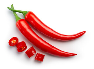 Chili pepper isolated. Chilli top view on white background. Whole and cut red hot chili peppers top. With clipping path. - obrazy, fototapety, plakaty