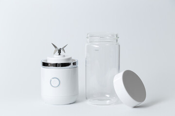 Portable small blender for making smoothie isolated on white background.