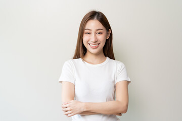 Fototapeta premium happy young asian woman smiling isolated on background.