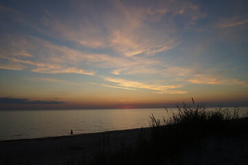 Cloudy sunset sky on the beach of the Baltic sea