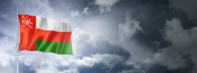 Oman flag on a cloudy sky