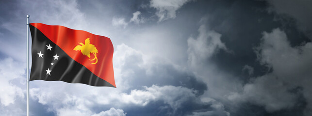 Papua New Guinea flag on a cloudy sky