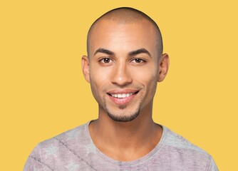 mature man posing on yellow background
