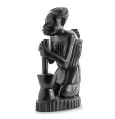 Wooden African statue of a woman working with a large mortar, and carying her child on her back  isolated on white