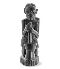 Wooden African statue of a woman working with a large mortar, and carying her child on her back  isolated on white