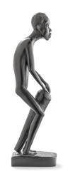 Wooden African statue of a skinny man working playing percussion, isolated on white
